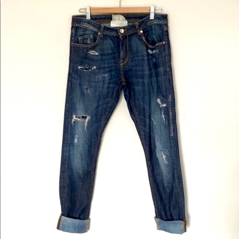Twinset women’s distressed skinny jeans.